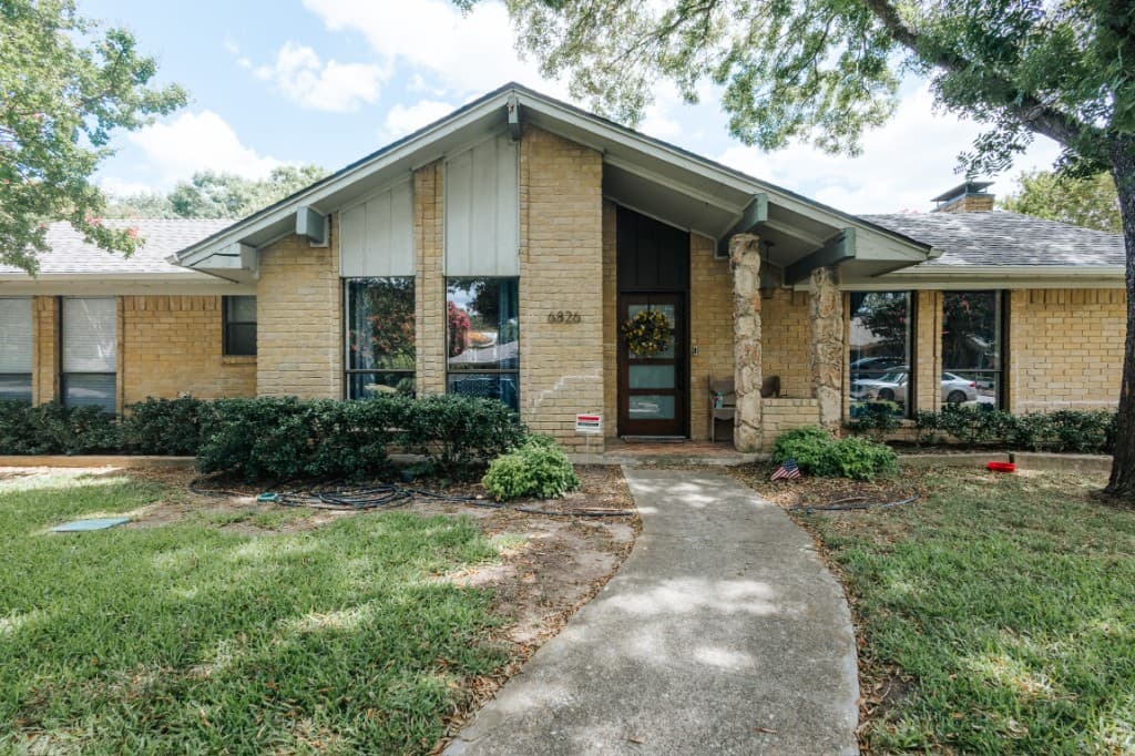 Before exterior painting - old paint in Dallas